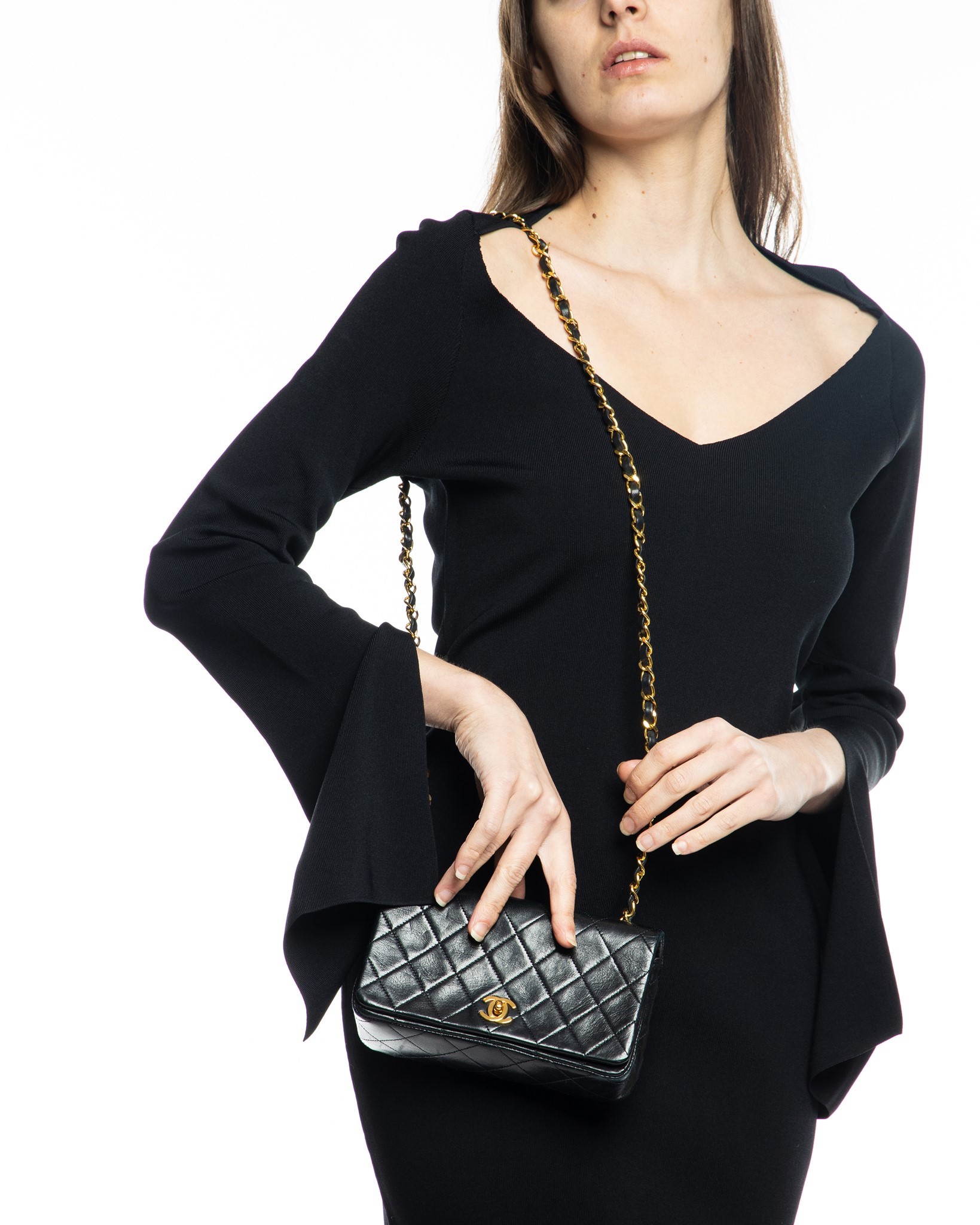 Nass boutique is a multi-brand boutique curating women's clothing and accessoriesVINTAGE  CHANEL MINI QUILTED SHOULDER BAG