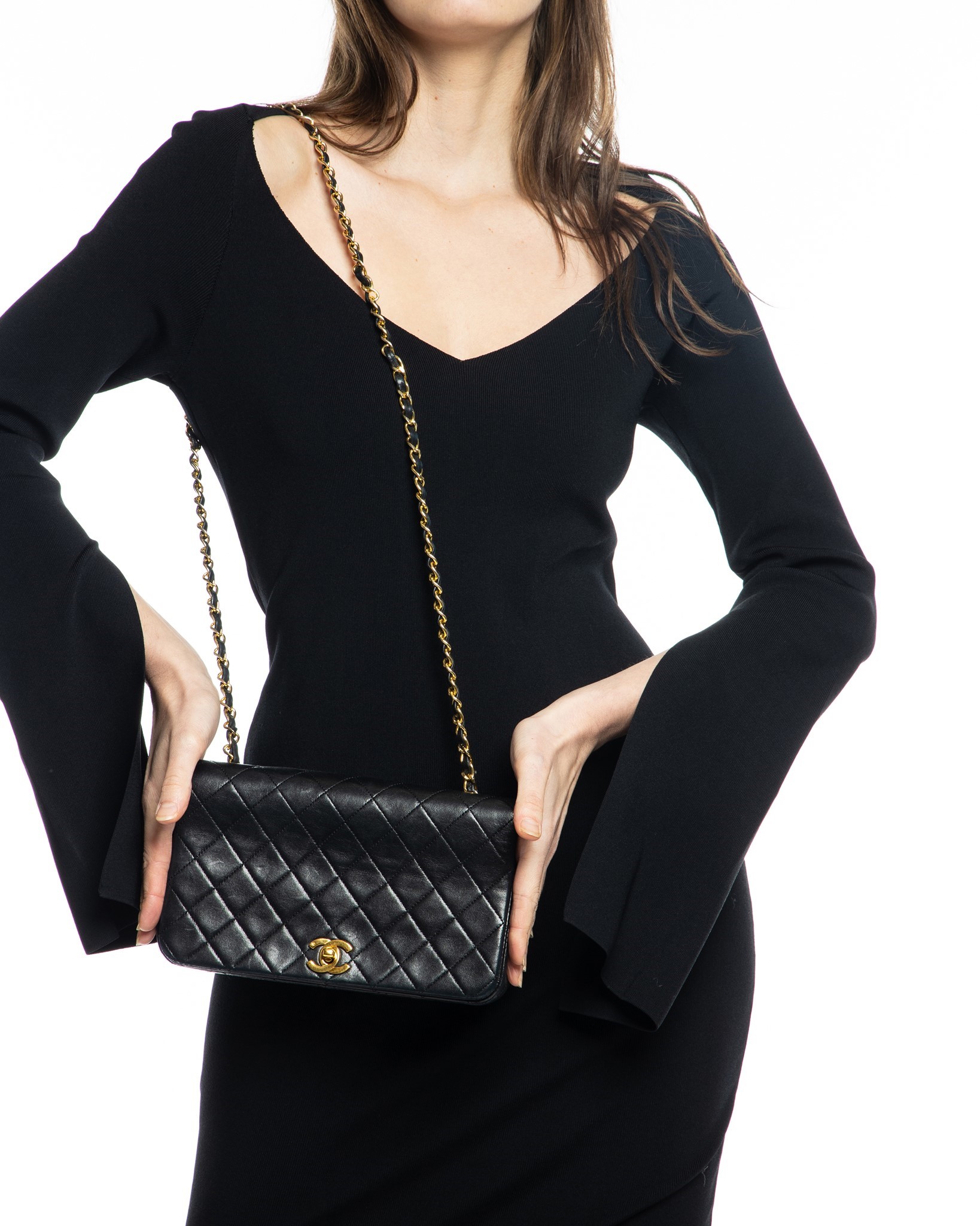 Nass boutique is a multi-brand boutique curating women's clothing and  accessoriesVINTAGE CHANEL BLACK QUILTED FLAP BAG