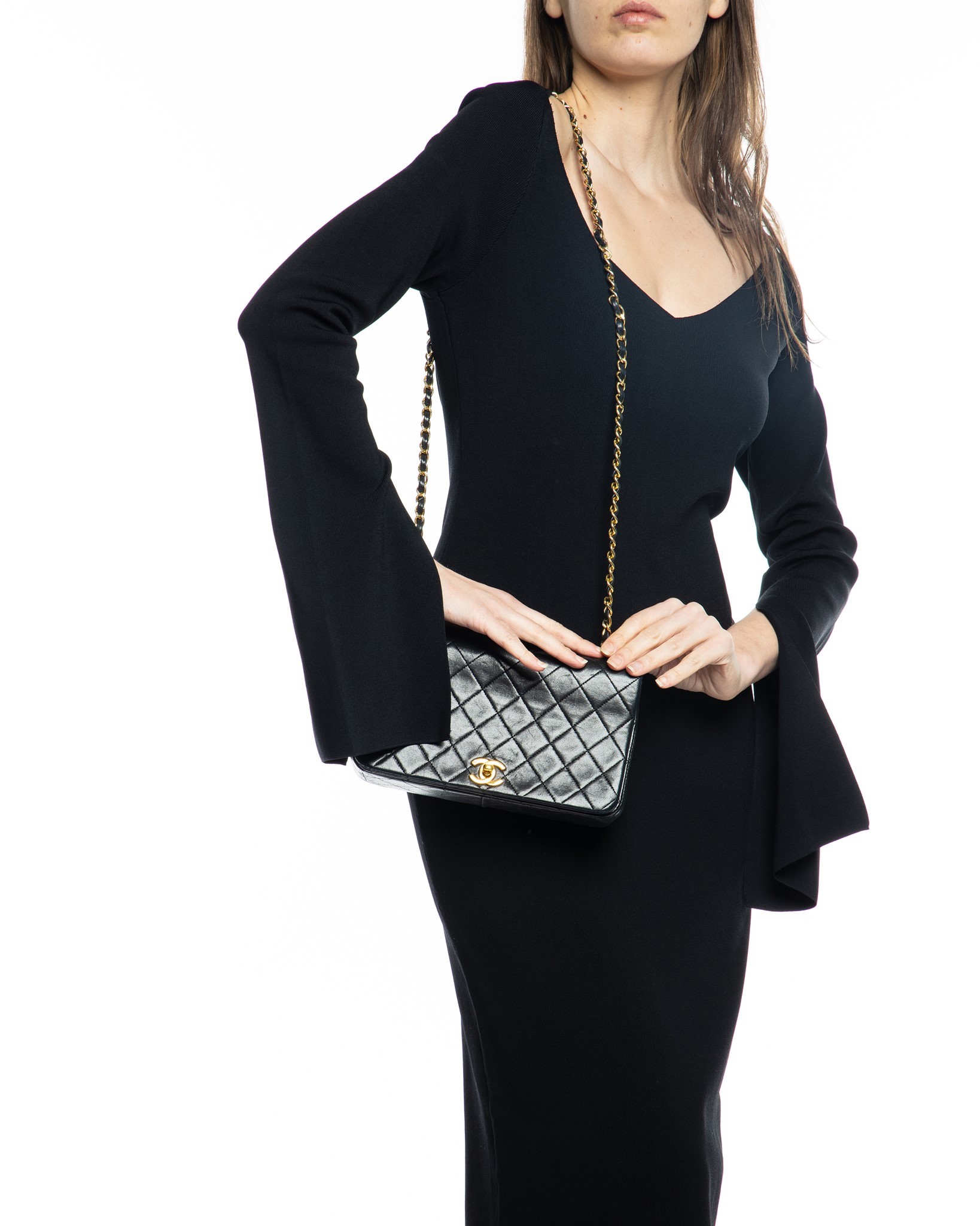 Nass boutique is a multi-brand boutique curating women's clothing and  accessoriesVINTAGE CHANEL BLACK QUILTED FLAP BAG