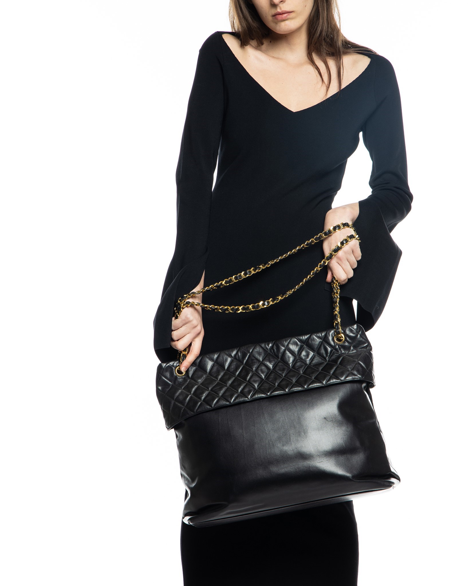 Nass boutique is a multi-brand boutique curating women's clothing and  accessoriesVINTAGE CHANEL LARGE QUILTED TOP BAG